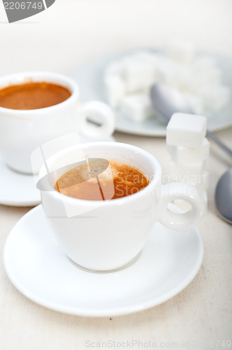 Image of Italian espresso coffee and sugar cubes