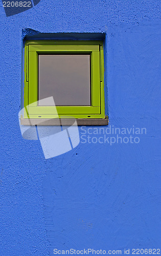 Image of Green window on blue wall