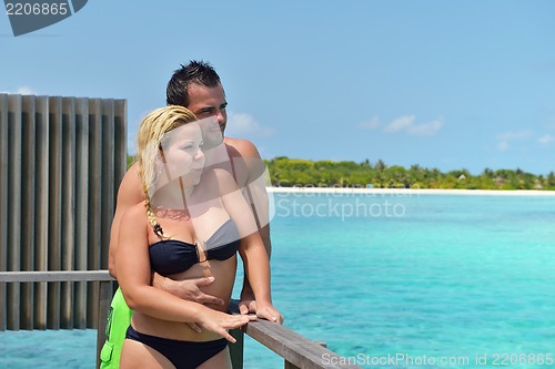 Image of happy young  couple at summer vacation have fun and relax