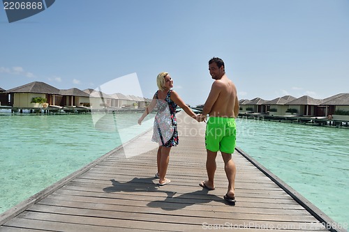 Image of happy young  couple at summer vacation have fun and relax