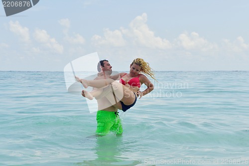 Image of happy young  couple at summer vacation have fun and relax