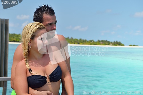 Image of happy young  couple at summer vacation have fun and relax