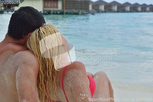 Image of happy young  couple at summer vacation have fun and relax