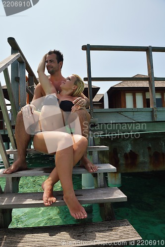 Image of happy young  couple at summer vacation have fun and relax