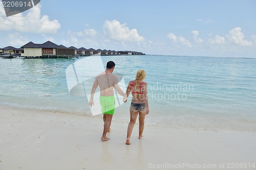 Image of happy young  couple at summer vacation have fun and relax