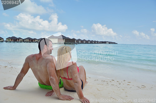 Image of happy young  couple at summer vacation have fun and relax