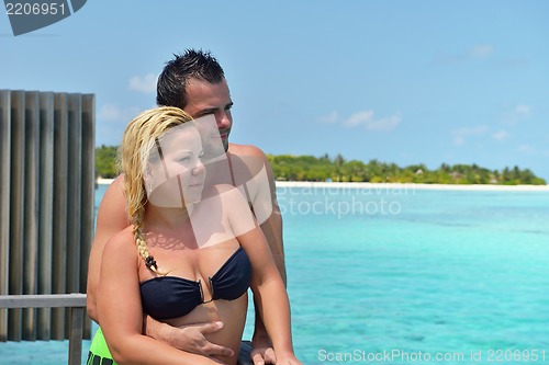 Image of happy young  couple at summer vacation have fun and relax