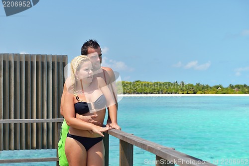 Image of happy young  couple at summer vacation have fun and relax