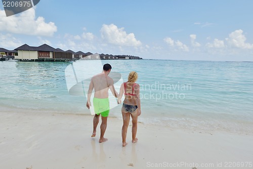 Image of happy young  couple at summer vacation have fun and relax