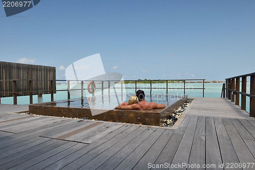 Image of happy young  couple at summer vacation have fun and relax