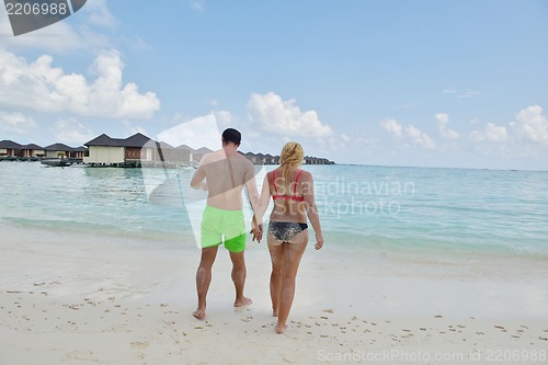 Image of happy young  couple at summer vacation have fun and relax