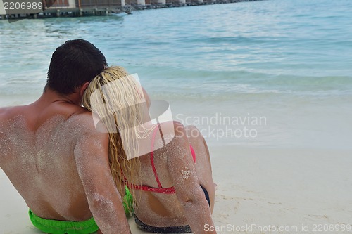 Image of happy young  couple at summer vacation have fun and relax