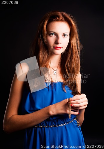 Image of beautiful young red haired woman