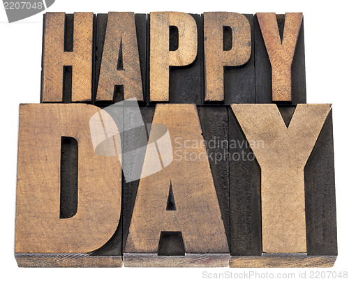 Image of happy day in wood type