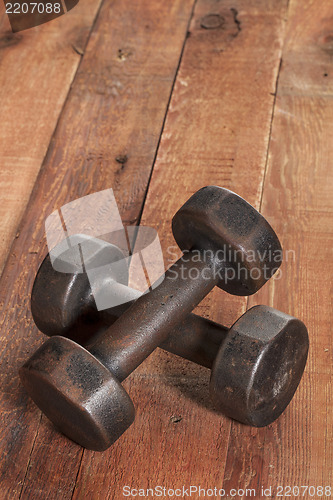 Image of vintage iron dumbbells