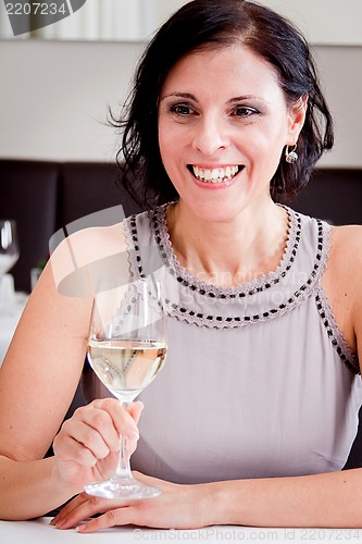 Image of happy smiling couple in restaurant celebrate