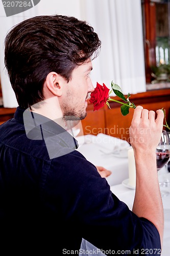 Image of happy couple in restaurant romantic date 