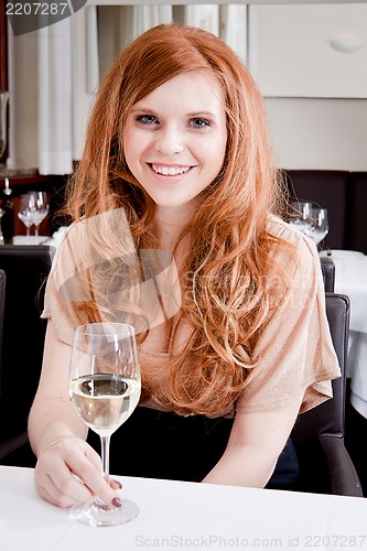 Image of happy smiling couple in restaurant celebrate