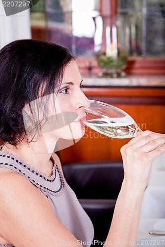 Image of happy smiling couple in restaurant celebrate