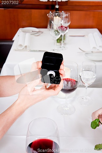 Image of happy couple in restaurant romantic date 