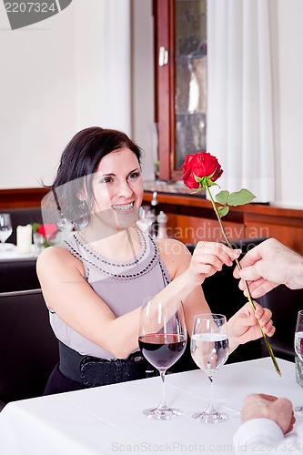 Image of happy couple in restaurant romantic date 