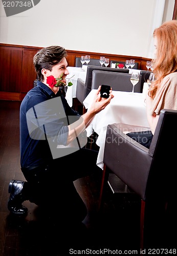 Image of happy couple in restaurant romantic date 