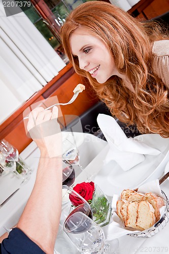 Image of happy couple in restaurant or dinner 