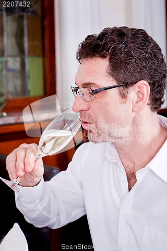 Image of happy smiling couple in restaurant celebrate