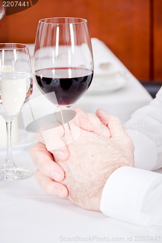 Image of happy smiling couple in restaurant celebrate