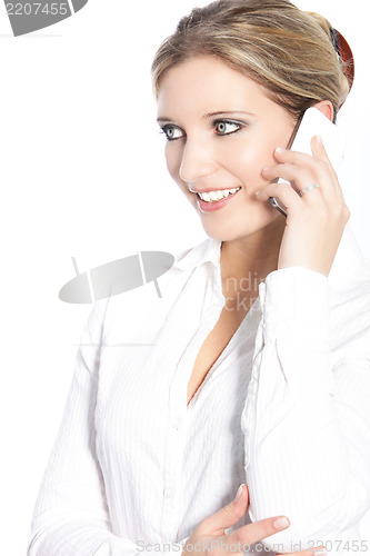 Image of Young woman talking on a mobile phone