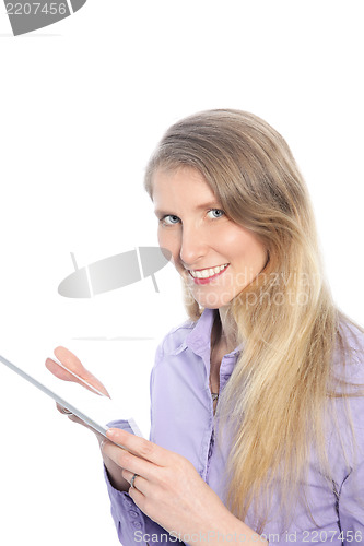 Image of Blonde attractive woman holding a tablet