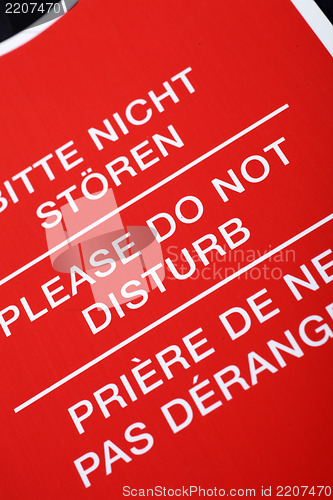Image of "Do not disturb!" sign in different languages