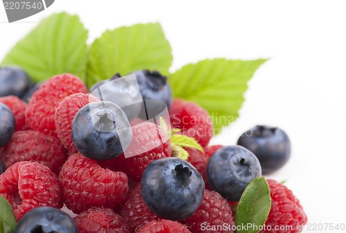 Image of Many blueberries & raspberries.