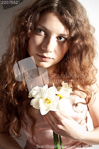 Image of beautiful woman with narcissus