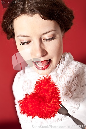 Image of lovely woman with red hear