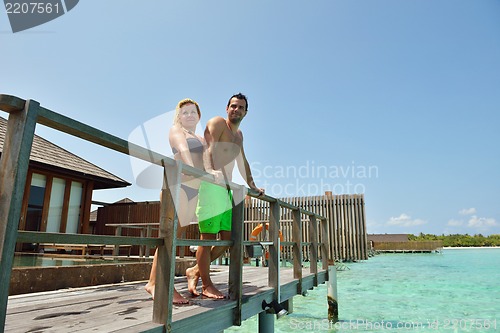 Image of happy young  couple at summer vacation have fun and relax