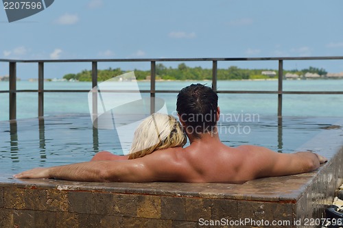 Image of happy young  couple at summer vacation have fun and relax