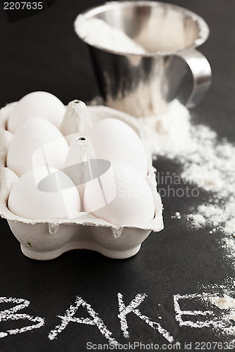 Image of Carton of eggs and flour