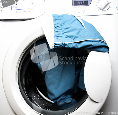 Image of Trousers and laundry.