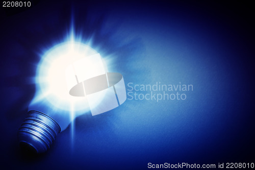 Image of Background with lit lightbulb