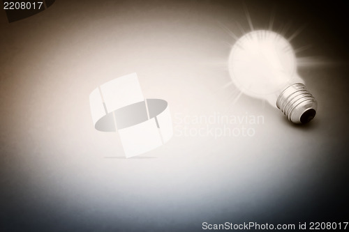 Image of Background with lit lightbulb