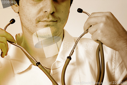 Image of Portrait of a young doctor with stethoscope.