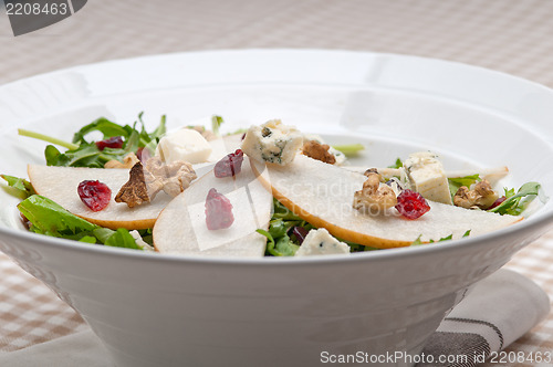 Image of Fresh pears arugula gorgonzola cheese salad