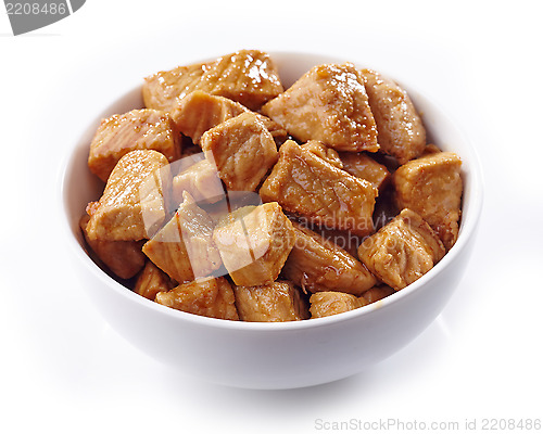 Image of pork stew in white bowl