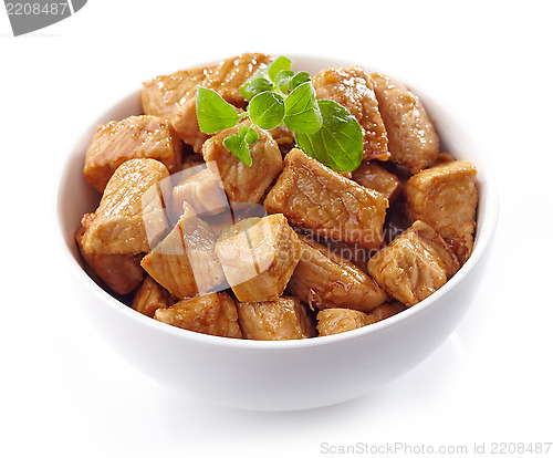 Image of pork stew in white bowl