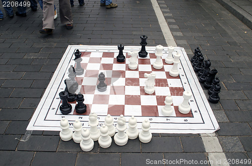 Image of huge chess game figure street event 