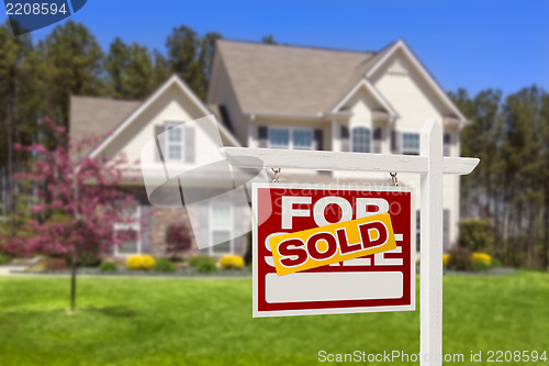 Image of Sold Home For Sale Real Estate Sign and House