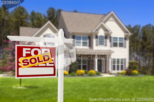 Image of Sold Home For Sale Real Estate Sign and House