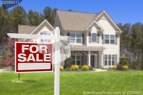 Image of Home For Sale Real Estate Sign and House