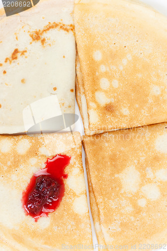 Image of Pancakes with raspberry jam/ the breakfast of the house